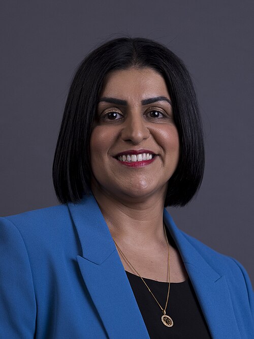 “Official portrait of Shabana Mahmood, UK Home Secretary, wearing a blue blazer.”